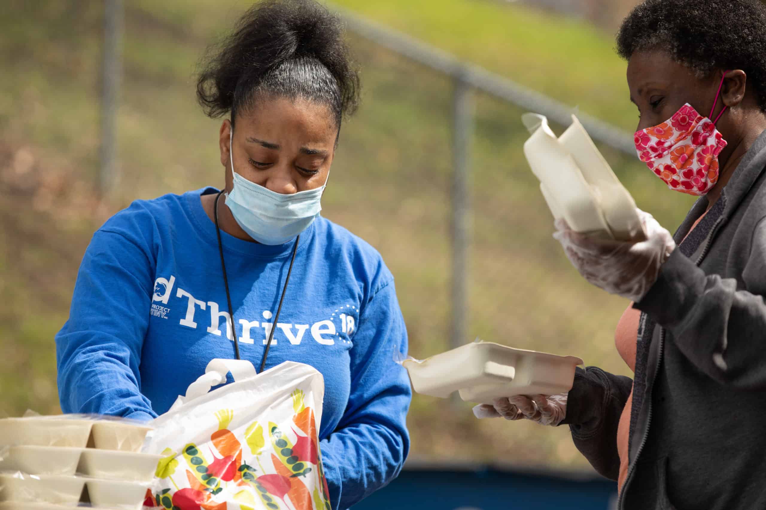 United Way Volunteer Distributing Meals