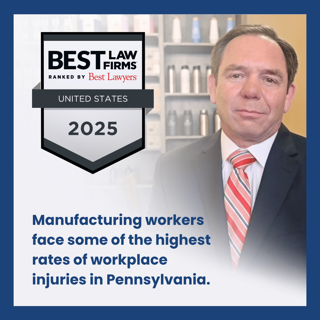 Best Law Firms United States 2025 Badge ranked by Best Lawyers, Dugan & Associates. Picture of law firm principal Mitch Dugan in a suit, white dress shirt, and red, pink and grey striped tie ready to speak about Manufacturing Workers' Compensation. Copy that reads "Manufacturing workers face some of the highest rates of workplace injuries in Pennsylvania."